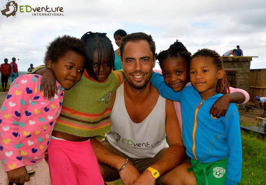 Jamie Christopherson with children on an EDventure International programme in South Africa